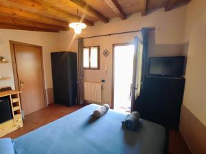 Postel nebo postele na pokoji v ubytování Camera con bagno e accesso indipendente