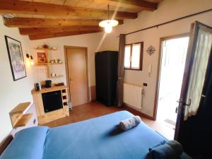 Postel nebo postele na pokoji v ubytování Camera con bagno e accesso indipendente