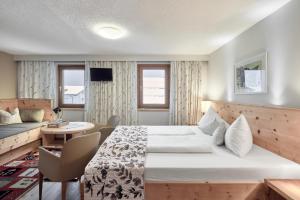 TV a/nebo společenská místnost v ubytování Bio Hotel Stillebach