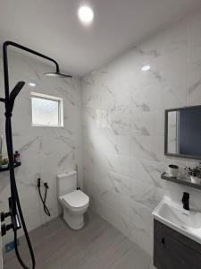 Ένα μπάνιο στο D'Laman Homestay