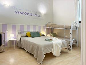 Postel nebo postele na pokoji v ubytování Holihome Le Rose