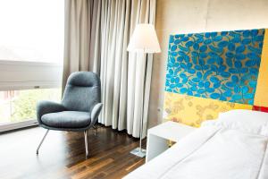 Ένα ή περισσότερα κρεβάτια σε δωμάτιο στο HOTEL APART - Welcoming l Urban Feel l Design
