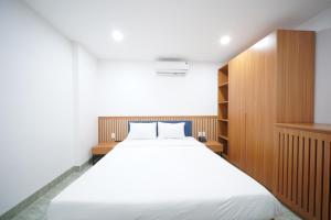Postel nebo postele na pokoji v ubytování Samya Hotel & Apartment