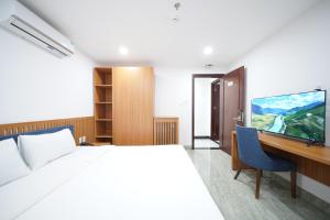 Postel nebo postele na pokoji v ubytování Samya Hotel & Apartment