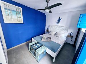 Postel nebo postele na pokoji v ubytování Casa mi sùeño azul + 19 fotografií