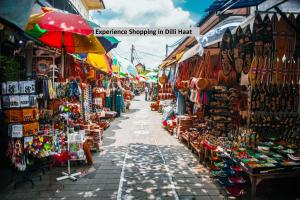 a street market with a lot of merchandise and souvenir shops at Collection O Near Kohat Enclave Metro Station in New Delhi