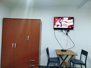 TV a/nebo společenská místnost v ubytování Citi Serviced Apartments - Gaba Place