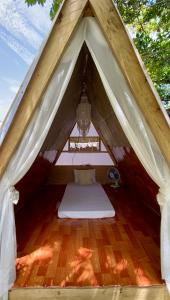 Postel nebo postele na pokoji v ubytování Tent House - ELEN INN - Malapascua Island + 4 fotografie