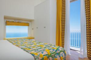 Postel nebo postele na pokoji v ubytování Five Positano