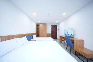 Postel nebo postele na pokoji v ubytování Samya Hotel & Apartment