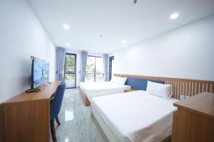 Postel nebo postele na pokoji v ubytování Samya Hotel & Apartment