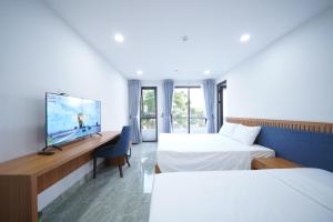 TV a/nebo společenská místnost v ubytování Samya Hotel & Apartment