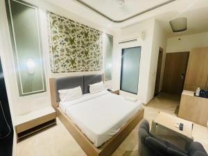 Postel nebo postele na pokoji v ubytování Hotel Star Suites By Star Group