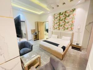 Postel nebo postele na pokoji v ubytování Hotel Star Suites By Star Group