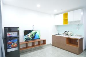 Kuchyň nebo kuchyňský kout v ubytování Samya Hotel & Apartment