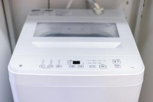 与那原町オーシャンビュー 窓から見える景色を想い出に The琉球タワー 10C的相册照片