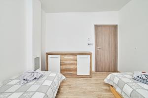 Posteľ alebo postele v izbe v ubytovaní Chalupa na Lipně - Holiday House 1