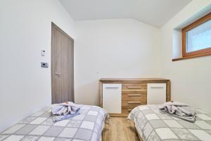 Posteľ alebo postele v izbe v ubytovaní Chalupa na Lipně - Holiday House 1