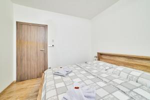 Posteľ alebo postele v izbe v ubytovaní Chalupa na Lipně - Holiday House 1