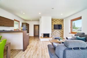 Televízia a/alebo spoločenská miestnosť v ubytovaní Chalupa na Lipně - Holiday House 1