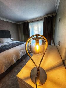 Postel nebo postele na pokoji v ubytování Tara Hotel + 6 fotografií