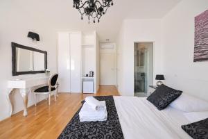 Postel nebo postele na pokoji v ubytování Tinel Superior Residence
