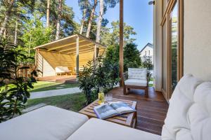 Κήπος έξω από το Apartamenty Szumimorze