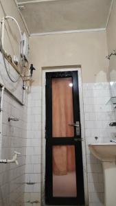 Ένα μπάνιο στο Royston Bungalow