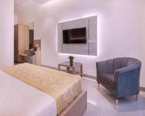 TV a/nebo společenská místnost v ubytování Hotel Star Suites By Star Group
