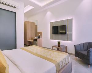 Postel nebo postele na pokoji v ubytování Hotel Star Suites By Star Group