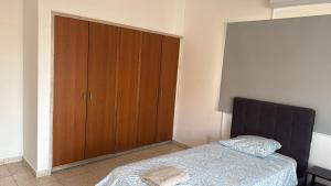 Ένα ή περισσότερα κρεβάτια σε δωμάτιο στο Unique City Center Rooms, 150m from Chabad Lubavitch