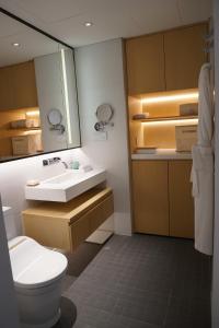 Koupelna v ubytování Zhengzhou Jianye Tianzhu International Apartment