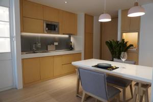 Kuchyň nebo kuchyňský kout v ubytování Zhengzhou Jianye Tianzhu International Apartment