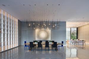 Posezení v ubytování Zhengzhou Jianye Tianzhu International Apartment