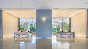 Posezení v ubytování Zhengzhou Jianye Tianzhu International Apartment
