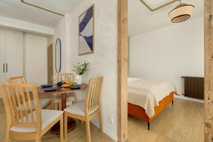 Ένα ή περισσότερα κρεβάτια σε δωμάτιο στο Apartamenty Szumimorze