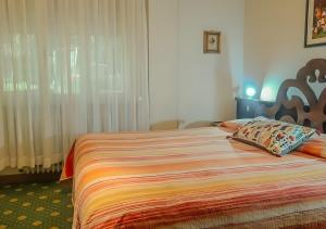 Postel nebo postele na pokoji v ubytování Bridge Hotel