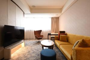 Sjónvarps- og/eða afþreyingartæki á Via Hotel Breeze