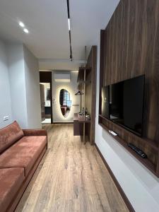 TV a/nebo společenská místnost v ubytování SOLs Center Rooms