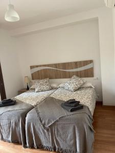 Postel nebo postele na pokoji v ubytování Chez Miró Corella