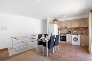 Kuchyň nebo kuchyňský kout v ubytování Apartamento Dourado Duplex