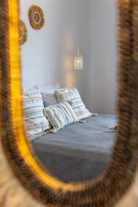 Postel nebo postele na pokoji v ubytování Cezaria Naxos Hotel