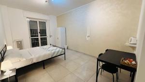 Postel nebo postele na pokoji v ubytování Fiordalisi home