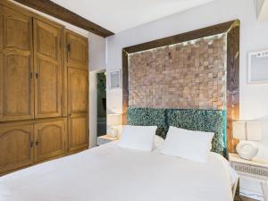 Giường trong phòng chung tại Tulum - Spa & Voyage