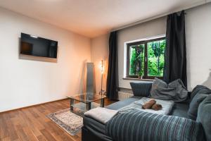 Et opholdsområde på Zentral am Fluss #1 + 4 billeder