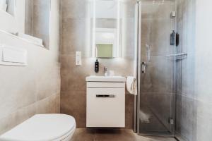 Koupelna v ubytování Hotel Bloemfontein + 37 fotografií
