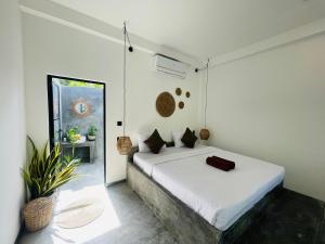 Ένα ή περισσότερα κρεβάτια σε δωμάτιο στο THE ISLaNDERS