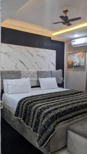Postel nebo postele na pokoji v ubytování Nems Appartment