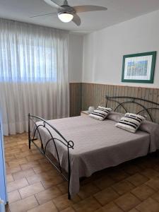 Katil atau katil-katil dalam bilik di Residenze Etruria