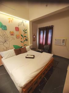 Postel nebo postele na pokoji v ubytování Sukoon River Homestay